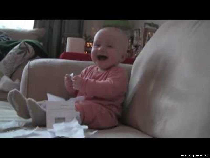 baby laughing at tearing paper baby laughing at tearing paper